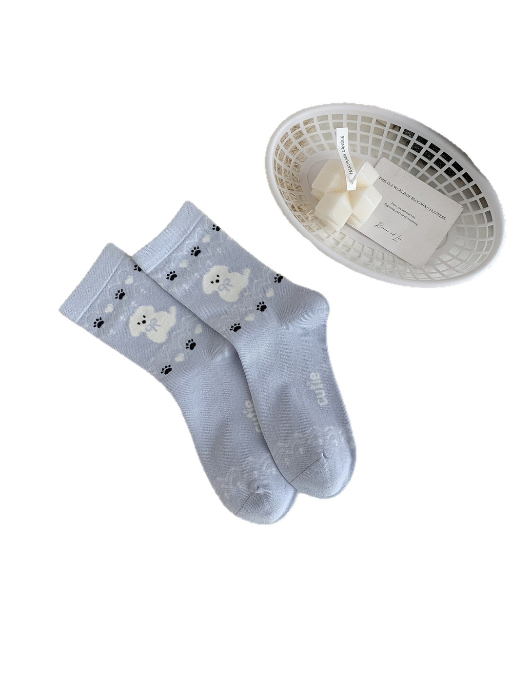 Dog Paw light blue crew socks with white dogs and black paw prints