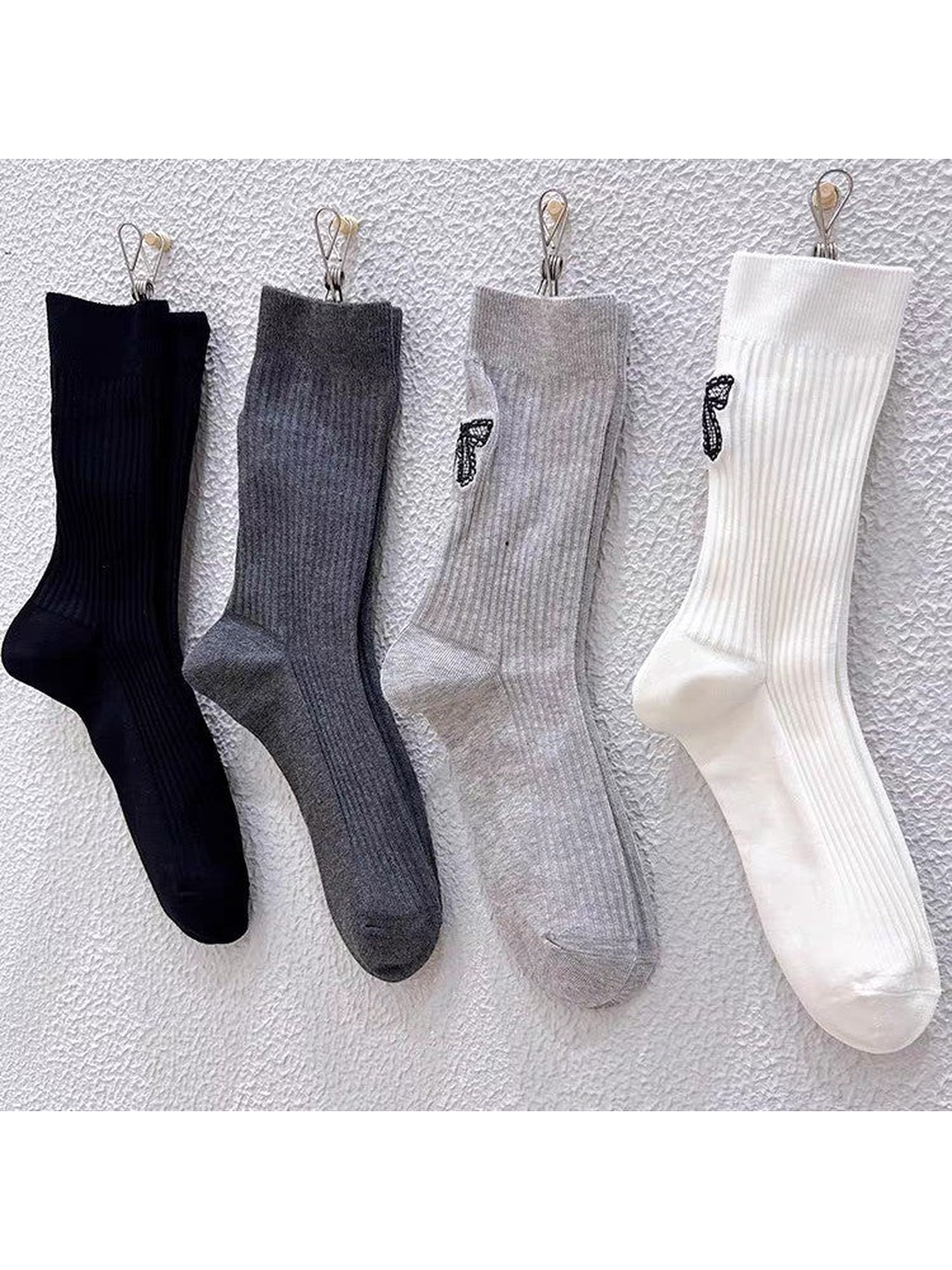 Black, Dark Gray, Light Gray and White ribbed crew socks displayed together