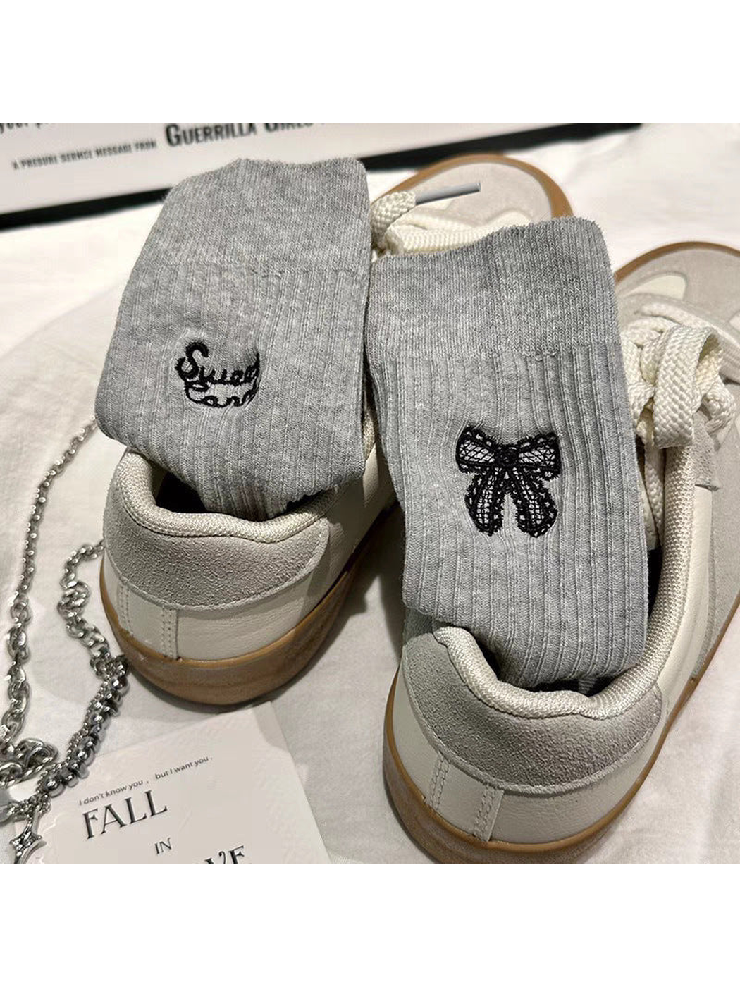 Light Gray ribbed socks with black bow and script embroidery