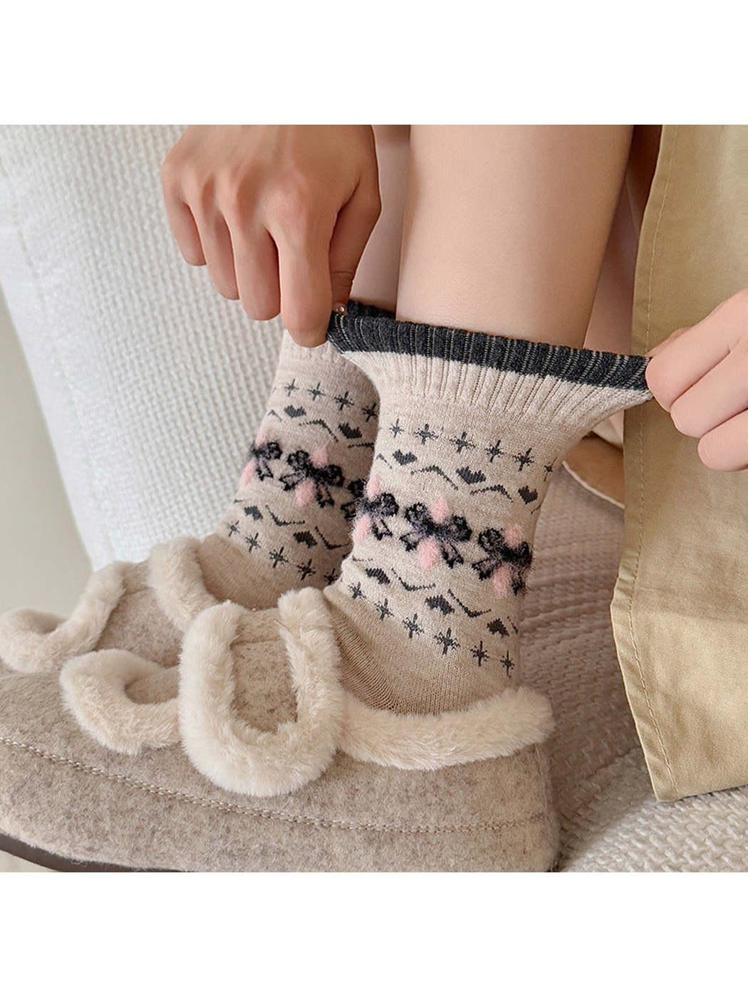Bow crew socks worn with beige plush slippers