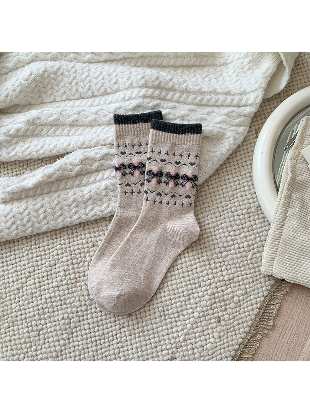 Bow crew socks with charcoal cuffs and pink accents