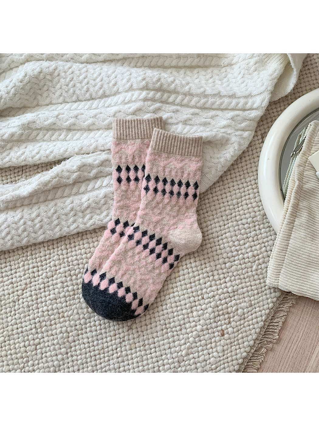 Fair Isle crew socks with pink and charcoal diamond pattern