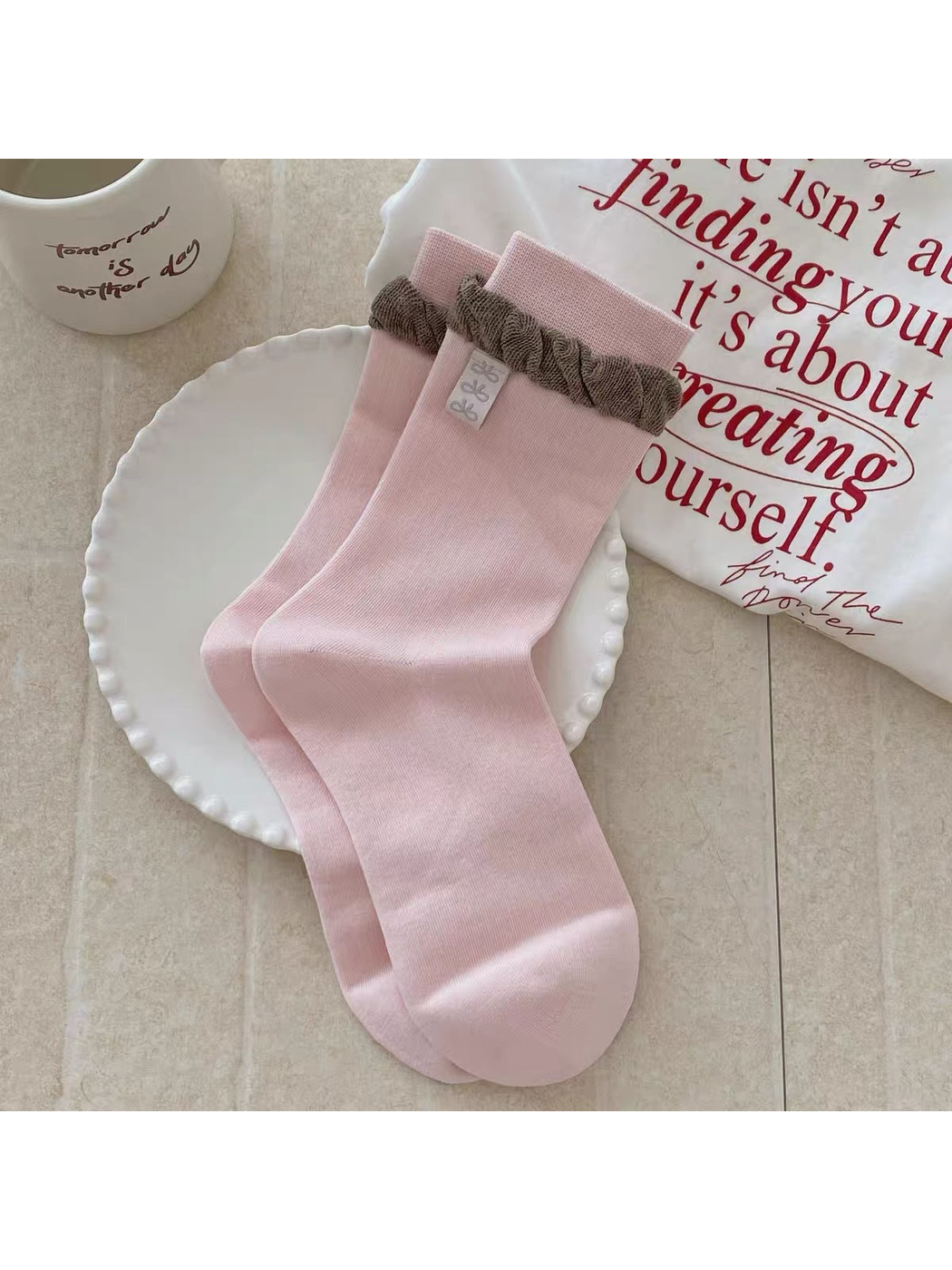 Pink Label socks with a brown gathered ruffle and exterior label