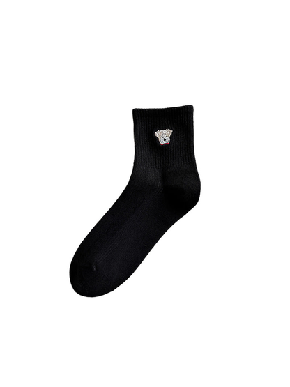 Black crew sock with white dog face embroidery, isolated view