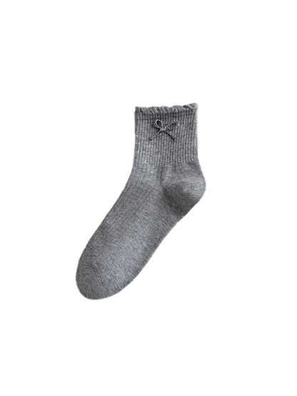 Gray crew sock with ruffled cuff and bow detail, isolated view