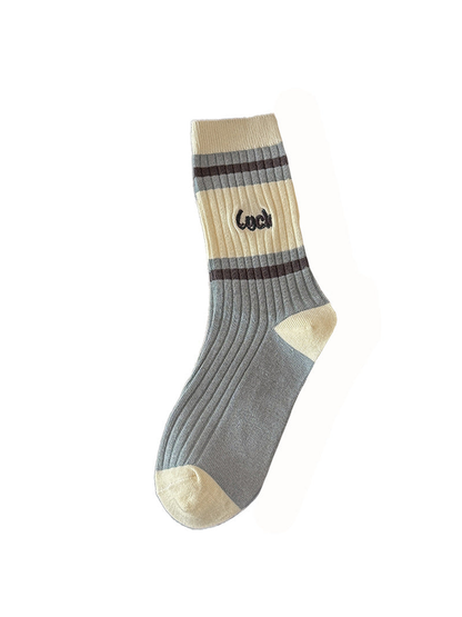 Luck style cream and pale blue ribbed crew sock with dark gray stripes