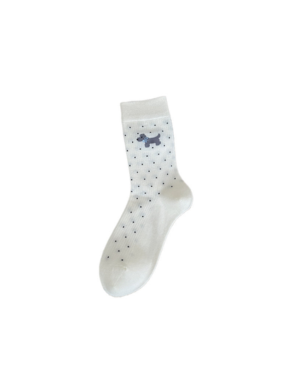 Ivory Dots crew sock with a dog motif and black dots