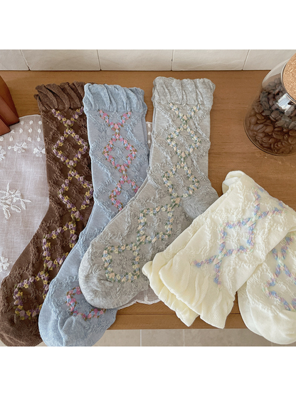 Coffee, Light Blue, Gray and Ivory openwork mid-calf socks displayed together