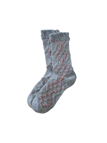 Light Blue mid-calf socks with a ruffled cuff and openwork diamond pattern