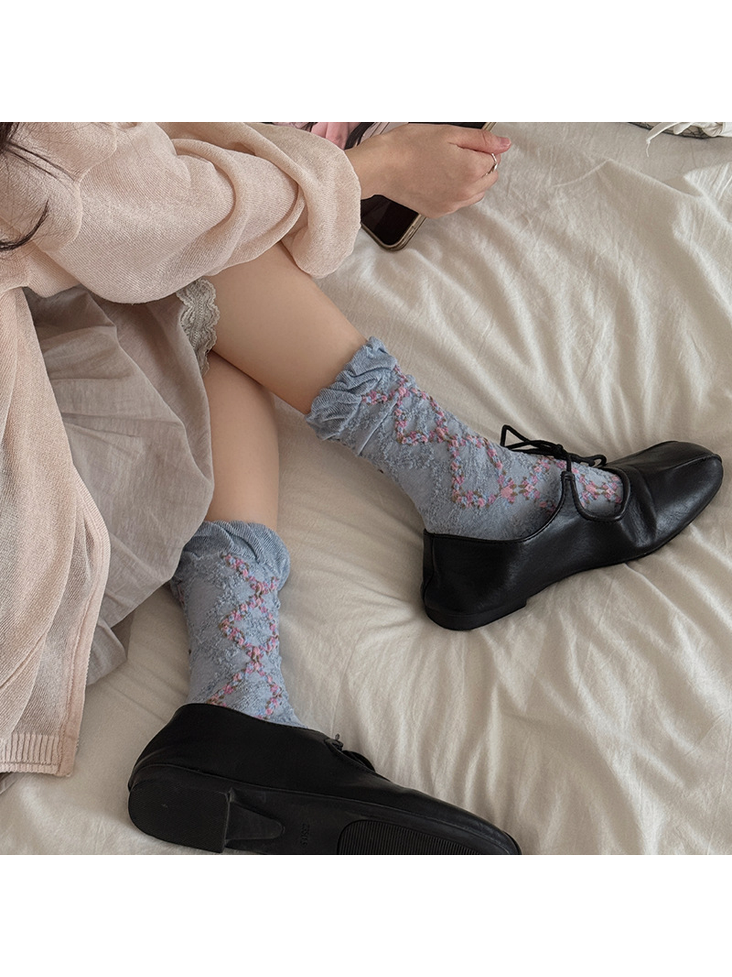 Light Blue openwork mid-calf socks styled with black shoes