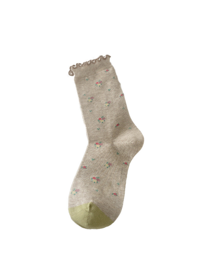 Ruffled Cuff crew sock with tiny floral motifs and a green toe