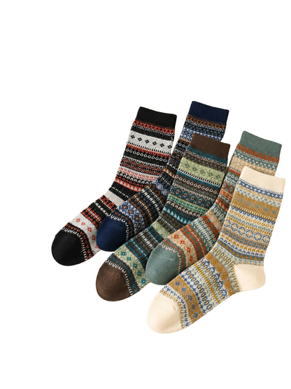 Five colors of geometric patterned crew socks displayed together