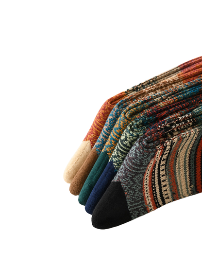 Geometric-pattern crew socks in multiple colors arranged side by side