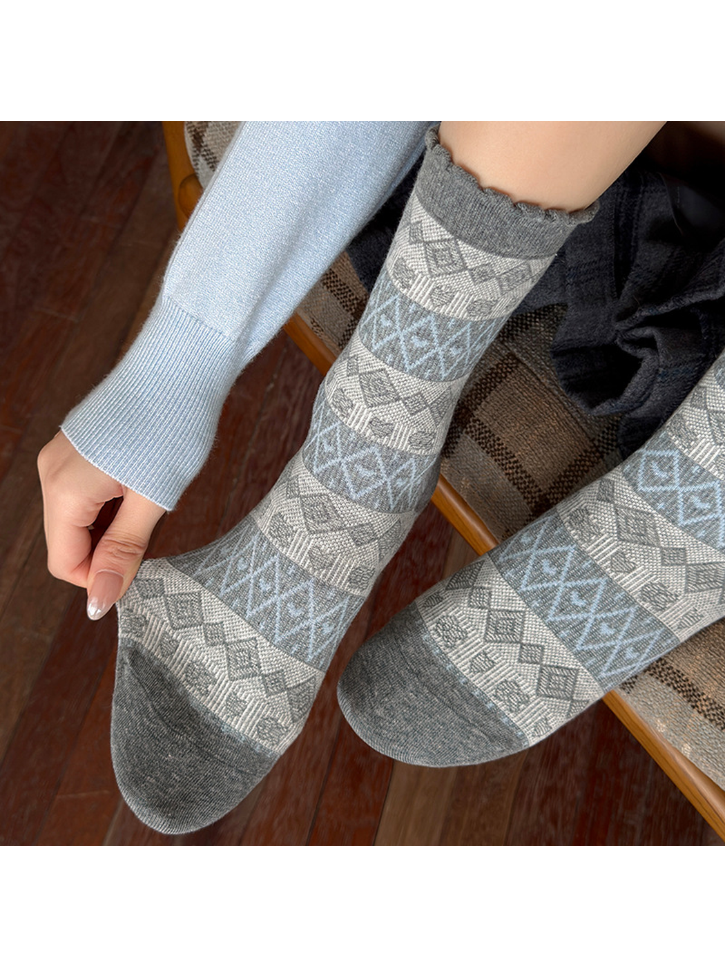 Close-up of Fair Isle geometric pattern and contrasting toes