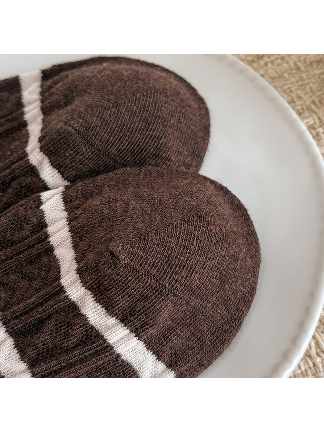 Close-up of Brown Stripe sock toe construction and knit texture