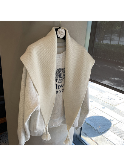 White textured triangle scarf with tassels, front view