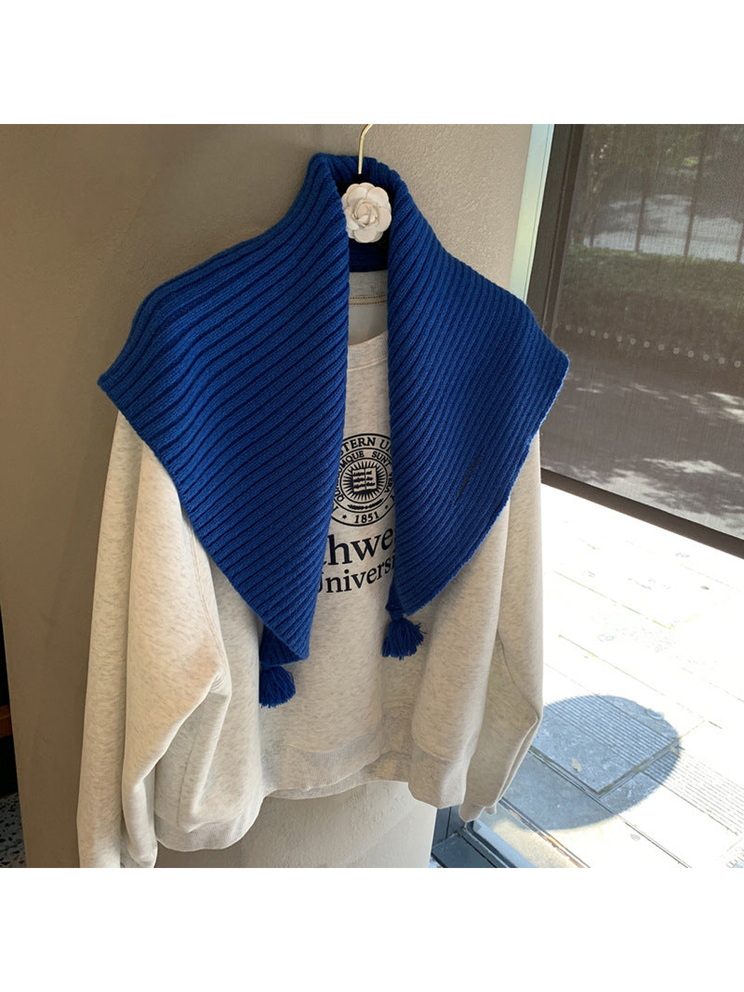 Blue ribbed triangle scarf with matching tassel ends