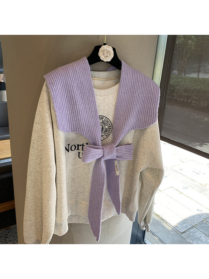 Light Purple ribbed tie-front shoulder scarf styled in a bow