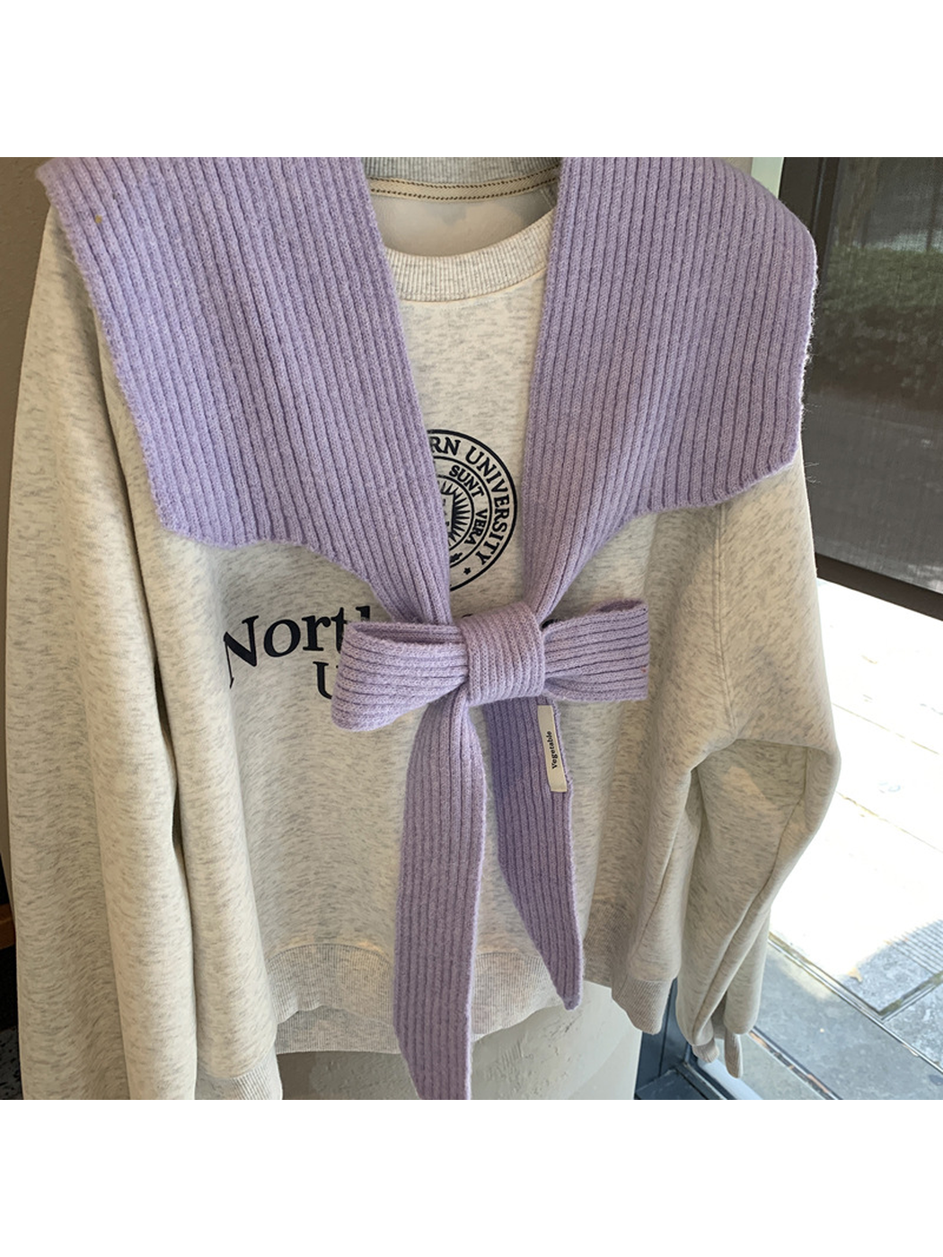 Close-up of the Light Purple scarf tied into a front bow