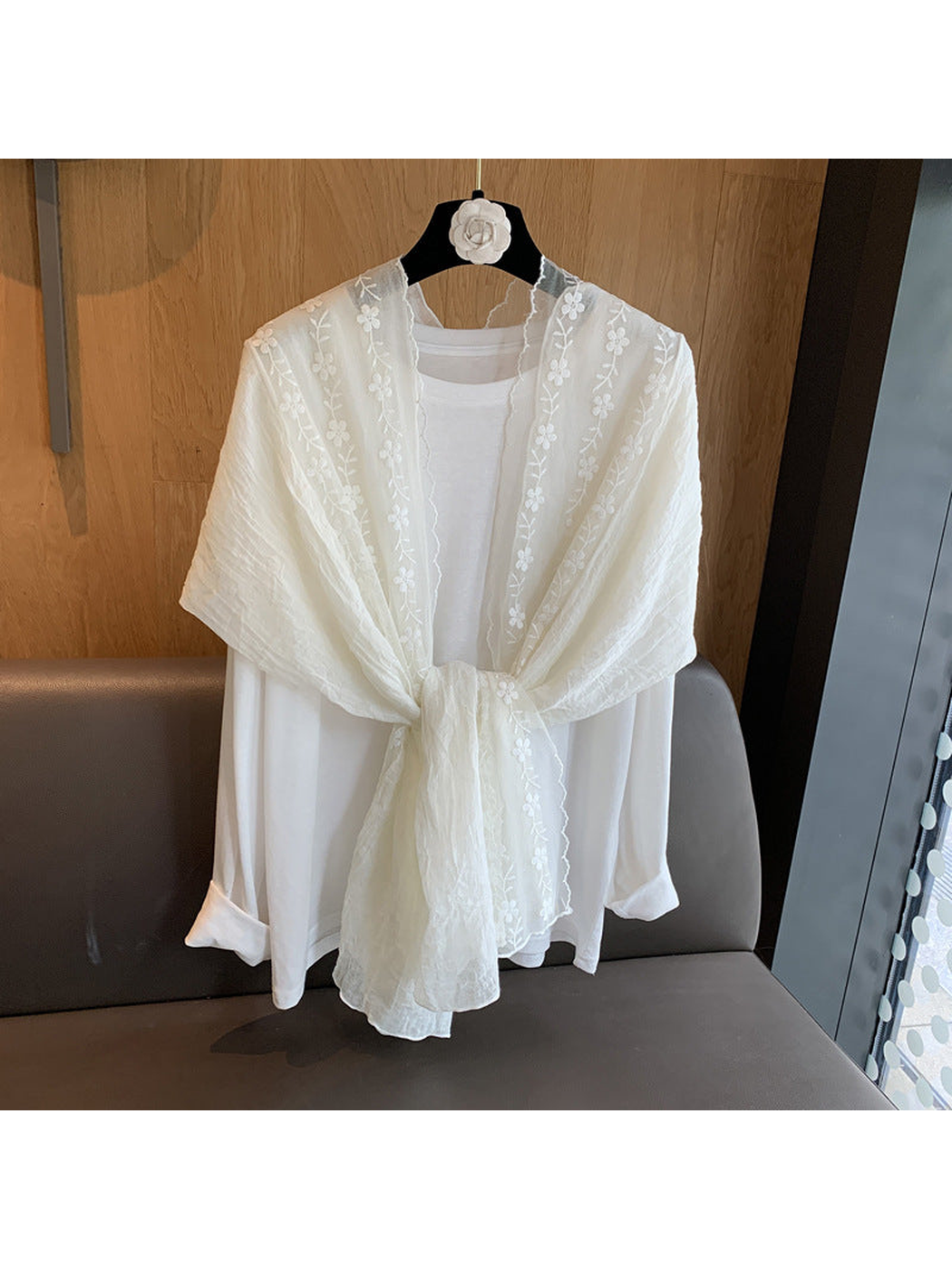 Ivory floral embroidered scarf styled in a front knot