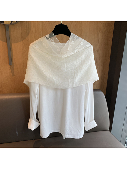 Ivory scarf wrapped across the shoulders, back view