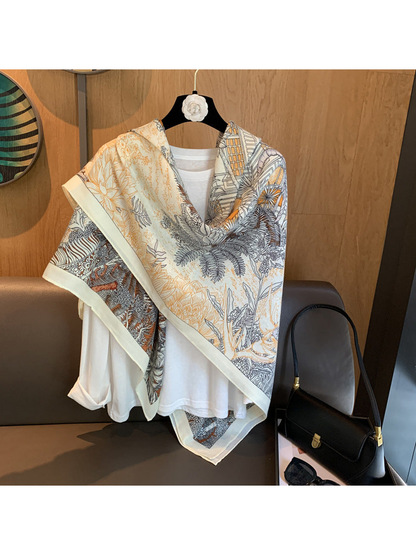 Multicolor square scarf draped diagonally to display its botanical line-art print
