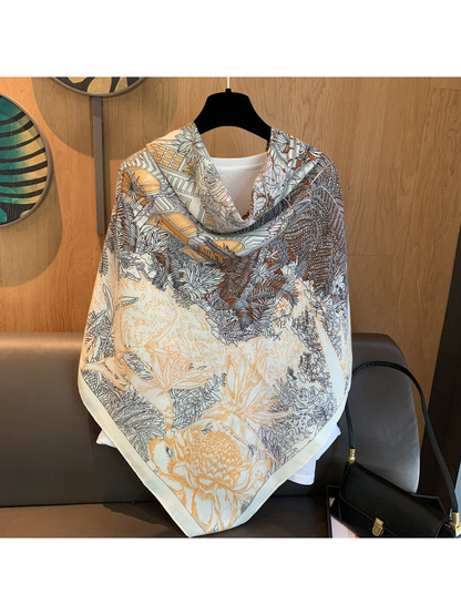 Multicolor square scarf draped broadly with floral and foliage motifs visible