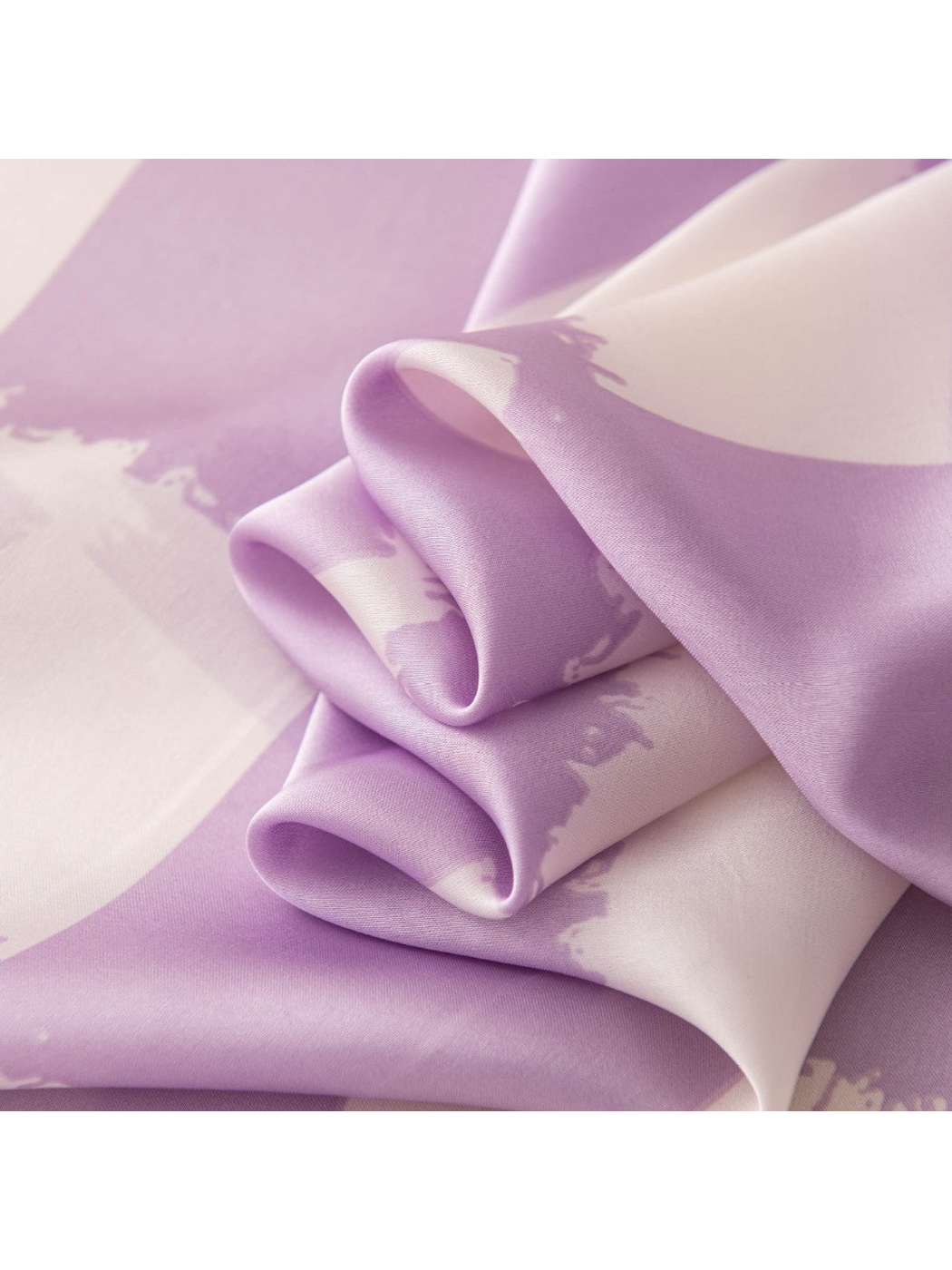 Close-up of the smooth finish and brush-edged purple checkerboard pattern