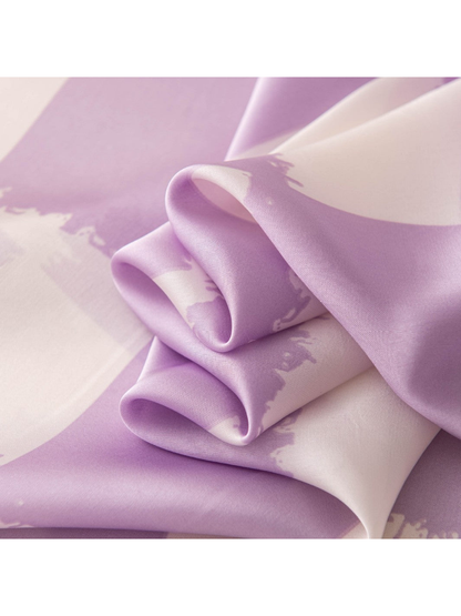 Close-up of the smooth finish and brush-edged purple checkerboard pattern