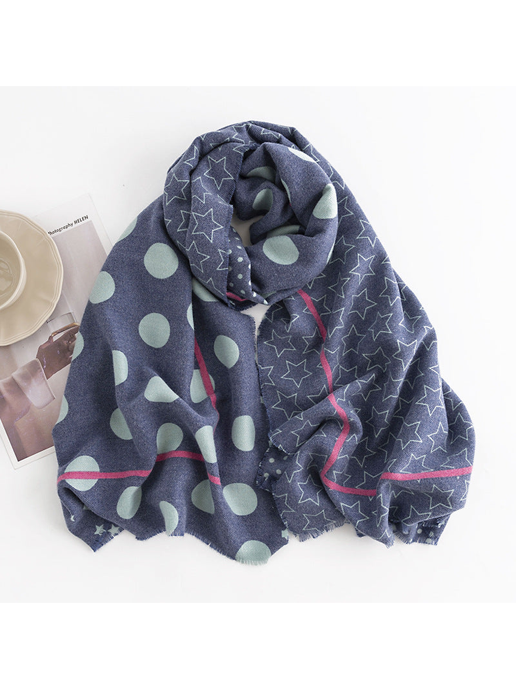 Navy scarf arranged to show mint dots, outlined stars and pink borders