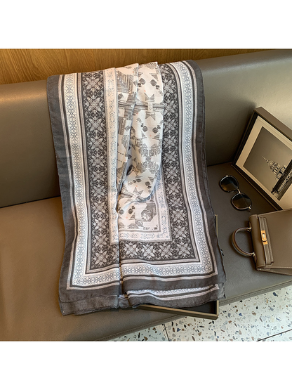 Gray and ivory rectangular scarf with geometric motifs and ornamental borders
