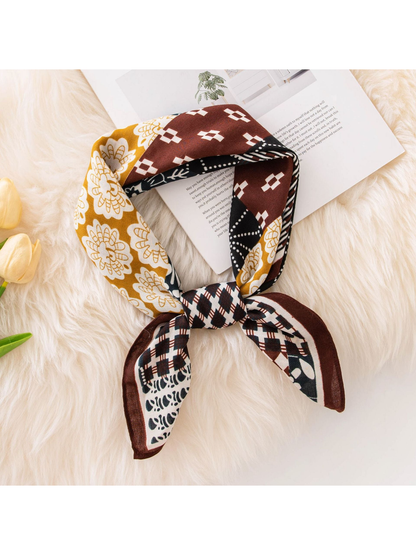 Brown, mustard and black patchwork square scarf styled in a loose knot
