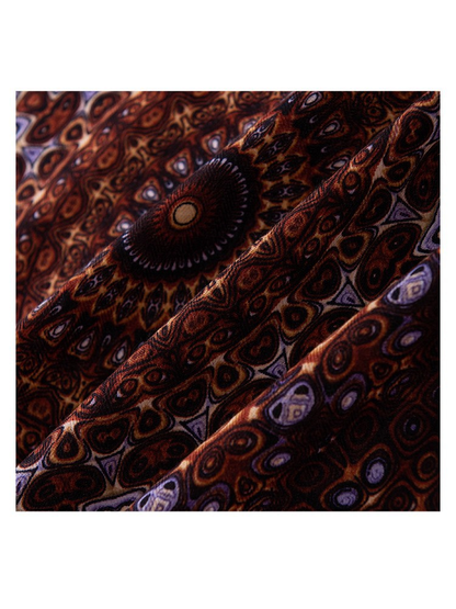 Close-up of the brown medallion print and fine woven-look texture