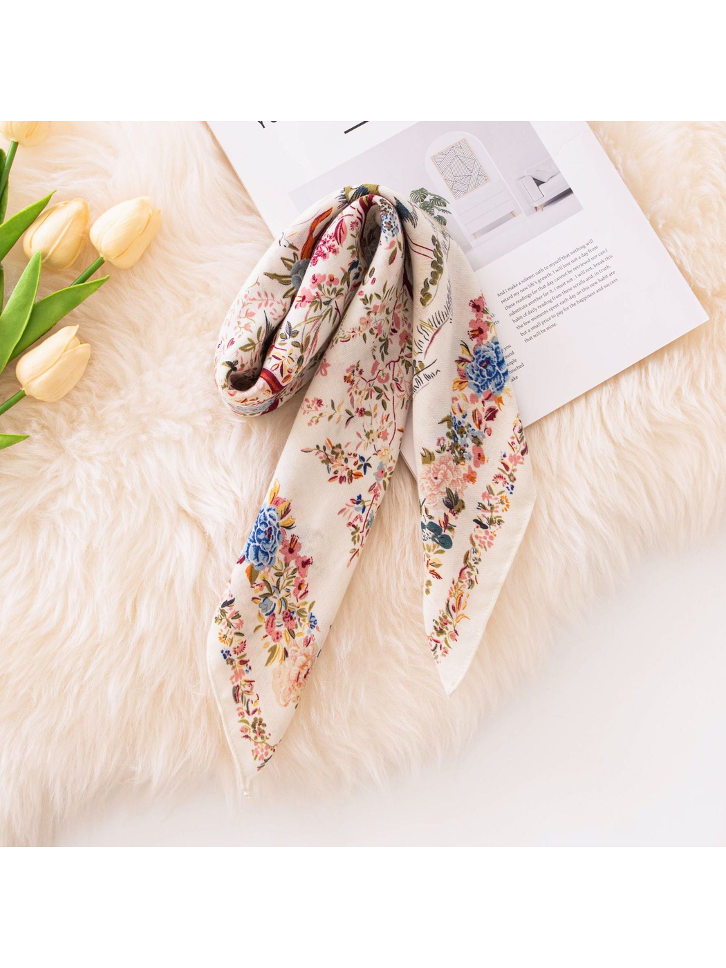 Ivory bird-and-floral square scarf loosely folded to show the floral border