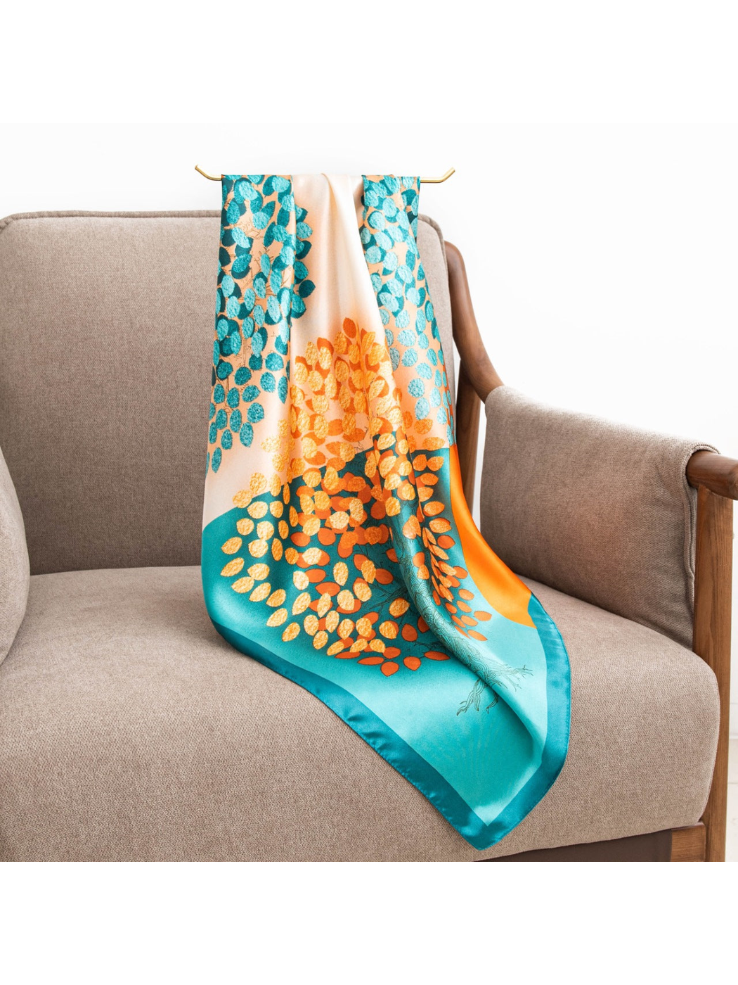 Multicolor square scarf draped across an armchair