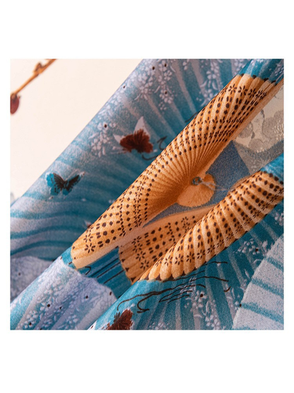Close-up of blue folding fans, butterflies and fine printed details