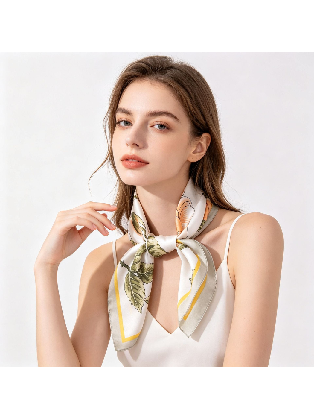 Peach and olive floral square scarf tied at the neck