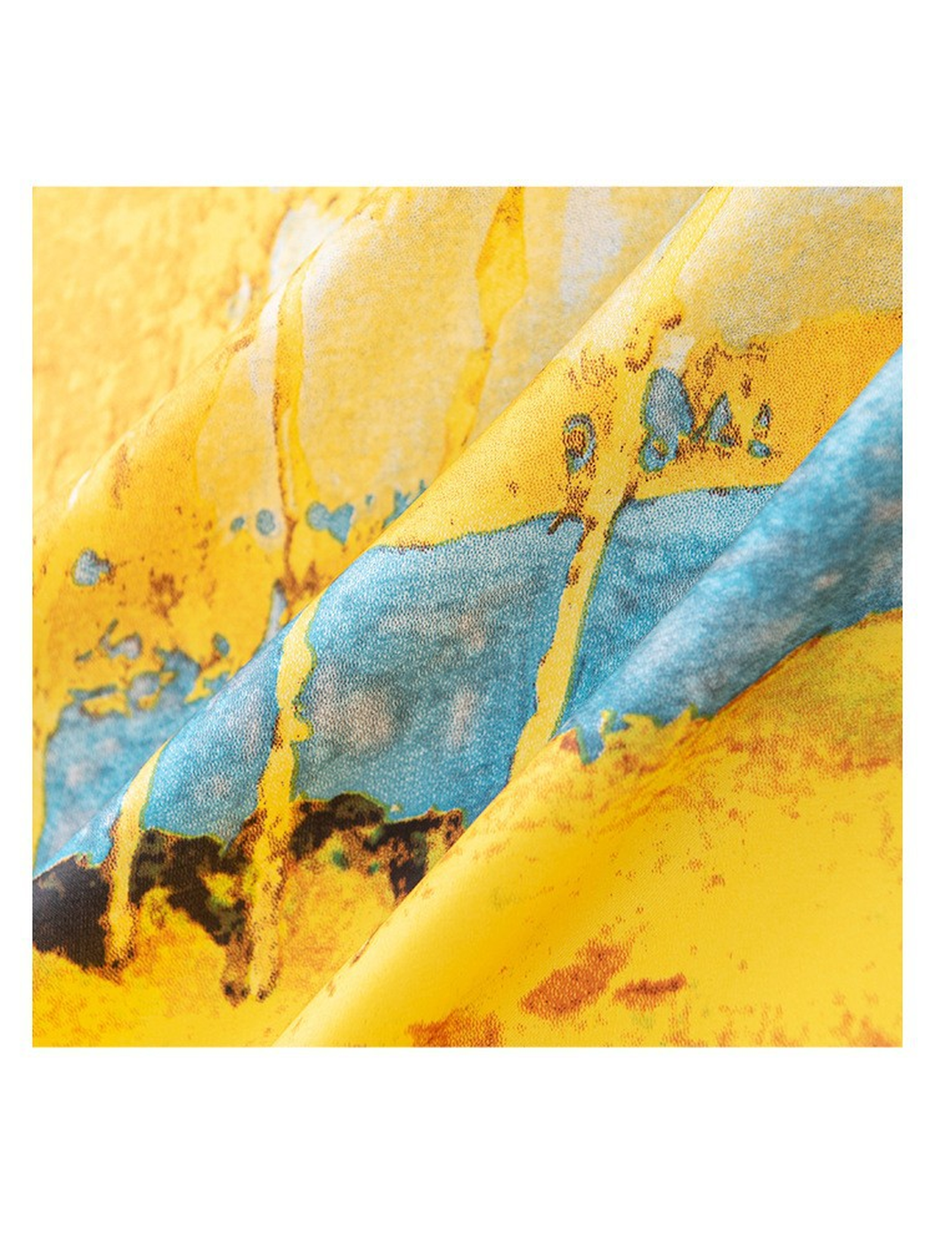 Close-up of the yellow and blue abstract print and fine surface texture