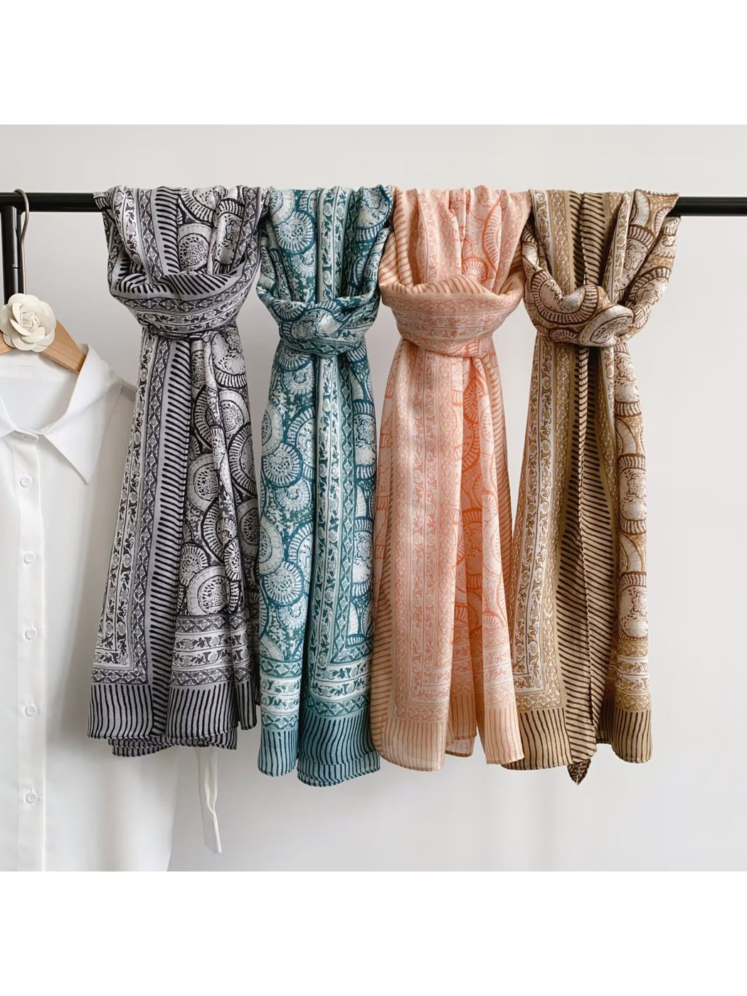 Brown, Orange, Multicolor and Teal Blue ornamental scarves displayed together
