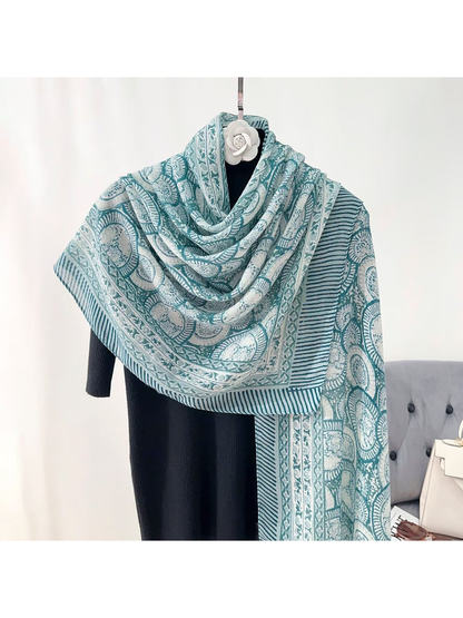 Teal Blue ornamental scarf with striped border, draped front view