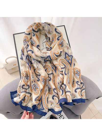 Navy Orange paisley scarf arranged in a loose wrap