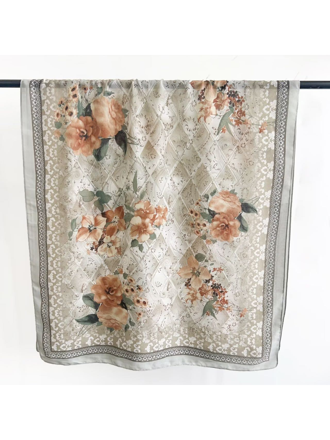 Light gray floral scarf with warm beige flowers and geometric border