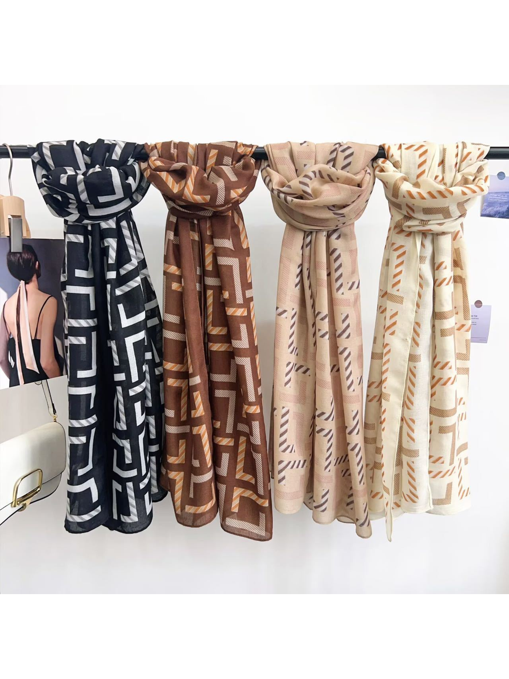 Ivory, Brown, Black Gray and Beige geometric scarves displayed together