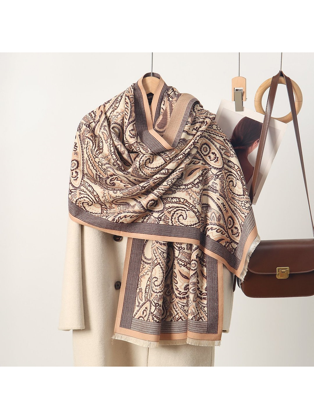 Camel paisley scarf with striped border and short fringe, draped view