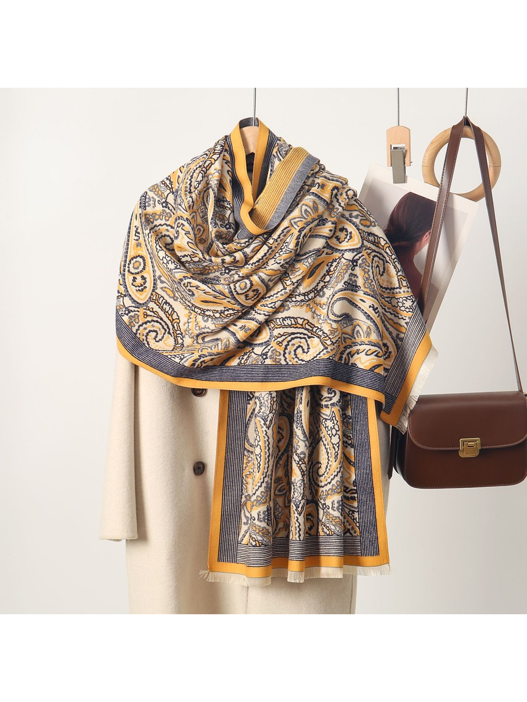 Mustard Yellow paisley scarf with striped border and short fringe, draped view