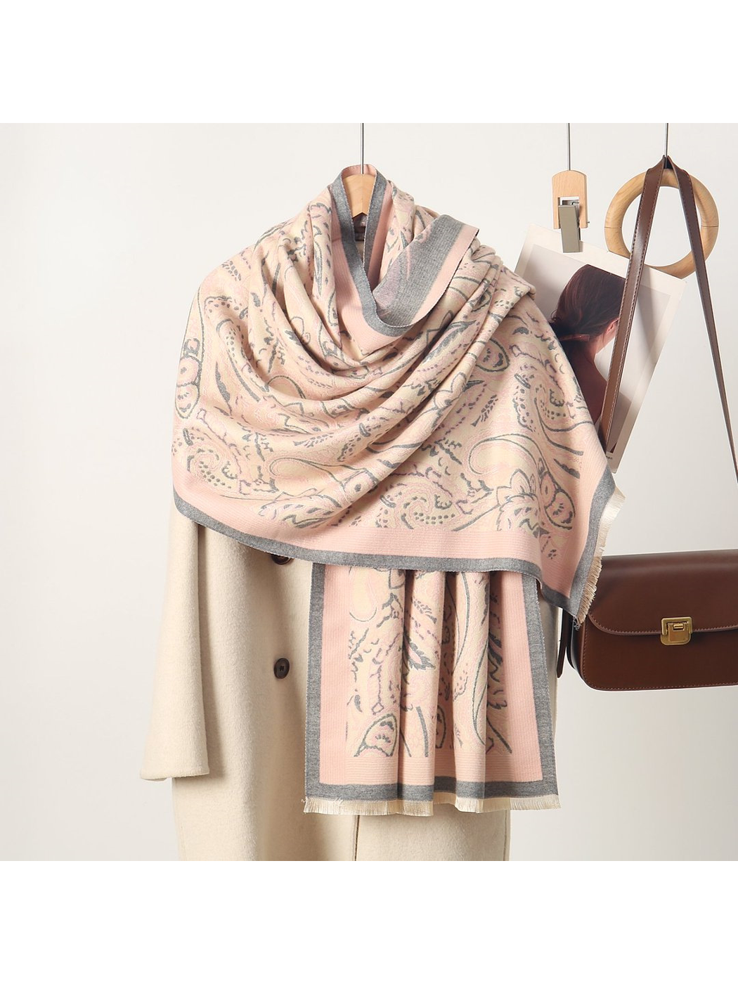 Light Pink paisley scarf with gray border and short fringe, draped view