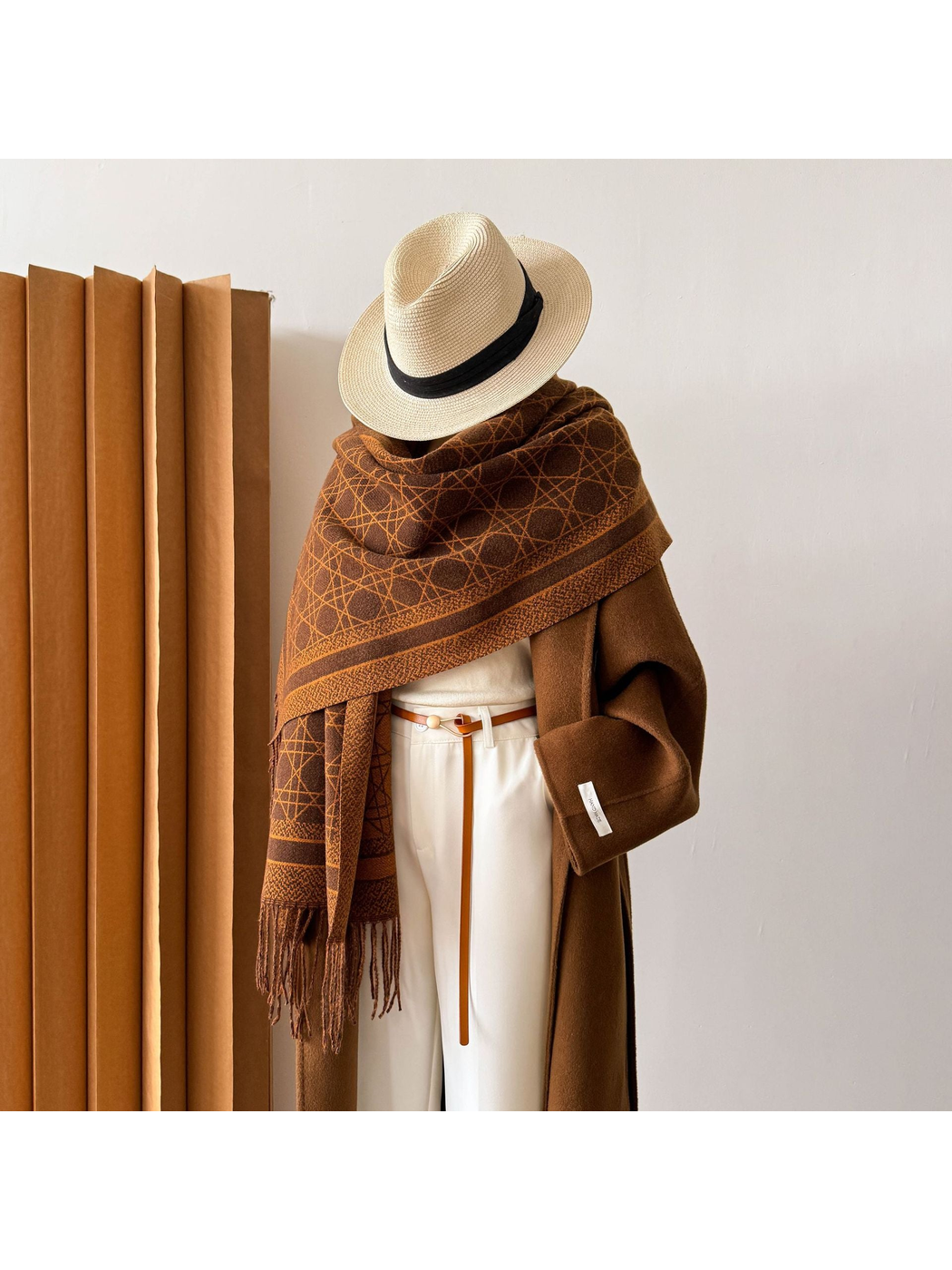 Dark Coffee abstract-line scarf styled as a broad shoulder wrap on a mannequin