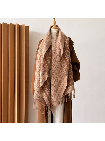 Camel abstract-line scarf worn open over the shoulders with fringed ends