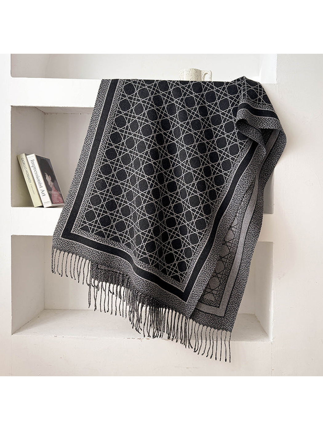 Black Gray abstract-line scarf with framed border and fringed ends, draped display