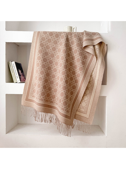 Greige abstract-line scarf with framed border and fringed ends, draped display